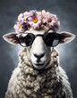 Beautiful cool sheep portrait in sunglasses with flowers on head