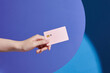 © Marc Tran/Stocksy - Hands holding plastic credit card for pay. This is Shopping concept