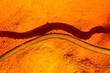 © Elena Saurius & Dani Rex/Stocksy - Abstract background of yellow sandy beach