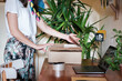 © Malquerida Studio/Stocksy - Anonymous closing a box to send