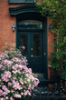 © Yakov Knyazev/Stocksy - American old house with blooming rose bush