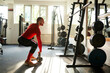 © Boris Jovanovic/Stocksy - Athlete man exercises with a kettlebell in front of a mirror