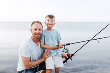 Father And Son Fishing Together