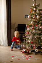 Holidays Background WItH Boy Decorated Christmas Tree