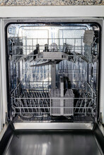Stainless Steel Dishwasher With Open Door. Before/After