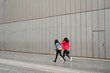© Mauro Grigollo/Stocksy - Women running in an urban area