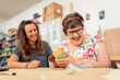 © Santi Nuñez/Stocksy - Therapist aids cognitive development, inspiring positivity.