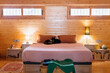 © Malquerida Studio/Stocksy - Interior design of wooden bedroom