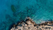 © Yakov Knyazev/Stocksy - spectacular close-up of a coast with blue water