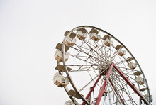 Ferris Wheel Against Overcast Plain Sky