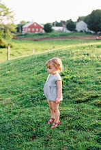Little Girl Outdoors In Countryside In New England