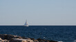 © Oleksandr Stalovierov/Stocksy - Sailboat in the sea in the sunny day.