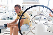 Skipper Resting On The Yacht