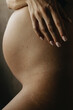 © Anastasia Mihaylova (Shpara)/Stocksy - Close up Pregnancy Beauty in sunlight