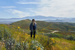 © Lauren Justice/Stocksy - A blonde girl surrounded by nature