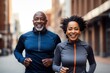 A middle-aged African-American couple during an evening jog through the streets of their neighborhood. Sports as the best remedy for aging.