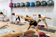 © Raul Navarro/Stocksy - group of people exercising