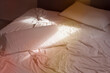 © Simone Wave/Stocksy - Warm light on the bed