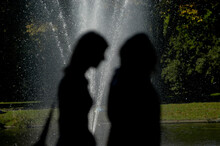 Silhouette Of Two Women 