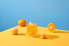 Fresh Tangerines And A Glass Of Their Juice. Healthy Food Concept.