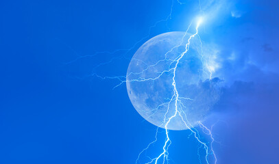 Wall Mural - lightning strikes between clouds with full moon at night 
