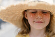 © Vradiy Art/Stocksy - Portrait of a girl in a straw hat