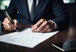 © alexxndr - person signing to contract with an pen