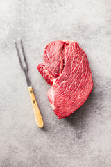 Canvas Print - Raw fillet steak beef meat on kitchen table. Top view.