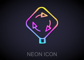 Sticker - Glowing neon line Roundabout traffic icon isolated on black background. Traffic circle road sign. Vector