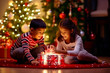© the_lightwriter - asian kids celebrate Christmas with gifts