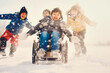 © the_lightwriter - kid in wheelchair playing in the snow