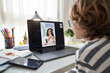 © ADDICTIVE STOCK CORE - Boy video chatting with girl playing flute
