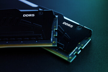 DDR5. Two modern high-performance memory modules DDR5 RGB RAM on a black background