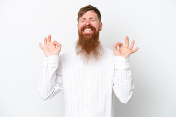 Wall Mural - Redhead man with long beard isolated on white background in zen pose