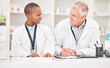 © Ilzer/peopleimages.com - Man, happy woman and medical documents in pharmacy for checklist, schedule or stock report for medicine. Help, mentor and pharmacist team at counter with inventory list, smile and insurance paperwork