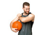 © luismolinero - Handsome young man playing basketball over isolated chroma key background suffering from pain in shoulder for having made an effort