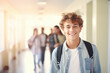 © Jasmina - Portrait of a young happy teenage boy in school. Study and education concept.