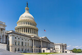 Fototapeta  - The United States Capitol building with American flag, Washington DC, USA.