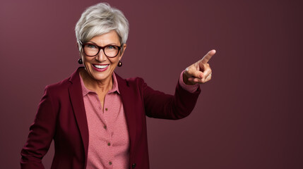 Wall Mural - Senior woman wearing casual clothes pointing with hand and finger to the side looking at the camera.