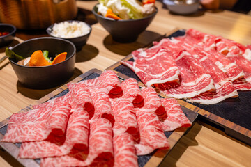 Poster - Slice of fresh raw beef in Hot pot restaurant