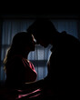 Man and Woman about to kiss in a dark bedroom. Concept of love, seduction and sex. 
