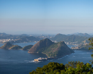 Wall Mural - Rio de Janeiro, Brazil: the stunning panoramic view of the skyline of the municipality of Niteroi seen from Morro da Urca (Urca Mountain), the first station of the Sugarloaf Cable Car 