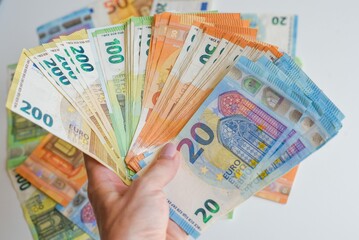 Wall Mural - Top view of a stack of euro banknotes