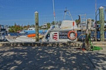 Sticker - Scenic view of a boat moored at a harbor on a sunny day