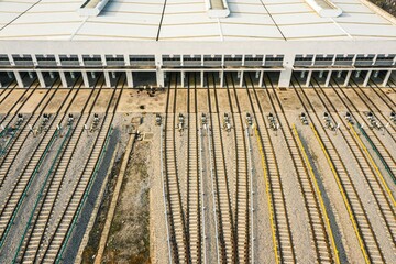 Sticker - Aerial shot of a bustling cityscape featuring multiple railroads and train tracks