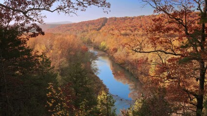 Wall Mural - Peaceful mountain vista overlook featuring blue river and yellow forest of trees during autumn sunrise in Arkansas Ozarks