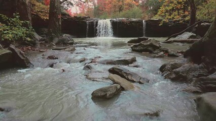 Wall Mural - Arkansas ozark mountains waterfall and rocky creek stream of water drone shot with arial motion  