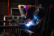 man welder, mig or tig welding, craftsman, erecting technical steel Industrial,  steel welder in factory technical