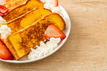 Wall Mural - french toast with fresh strawberry and whipping cream