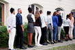 © Andrey Popov - Queue Outdoors. Business People Waiting
